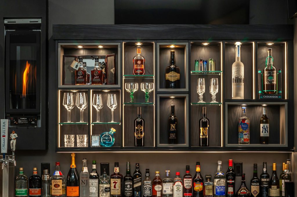 Home bar ideas with bottles on a shelf